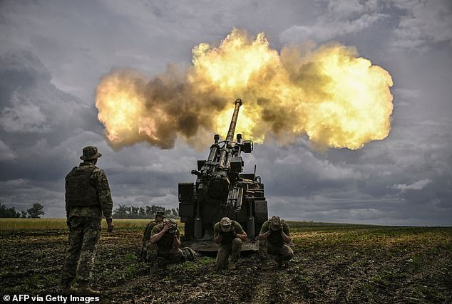 Ukrainian soldiers fire with a French self-propelled cannon of 155 mm / 52 caliber Caesar towards Russian positions on the front line of the Donbas