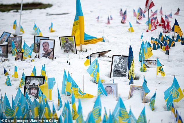 A makeshift memorial made of thousands of personalized small flags for the fallen defenders of Ukraine