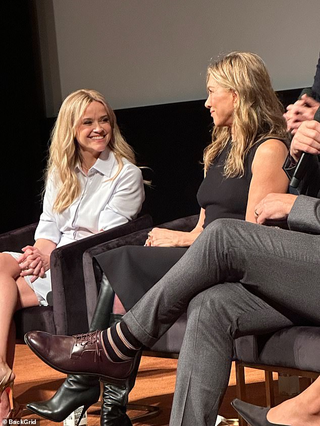 Aniston and Reese sat next to each other on stage, where they smiled as they shared their thoughts about the show