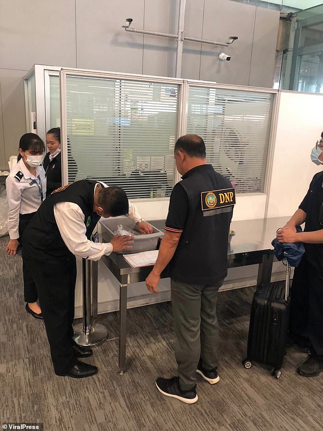 As the Taiwanese smuggler stood in line for airport security, he hoped staff wouldn't notice the huge bulge in his pants – and the fact that it kept moving