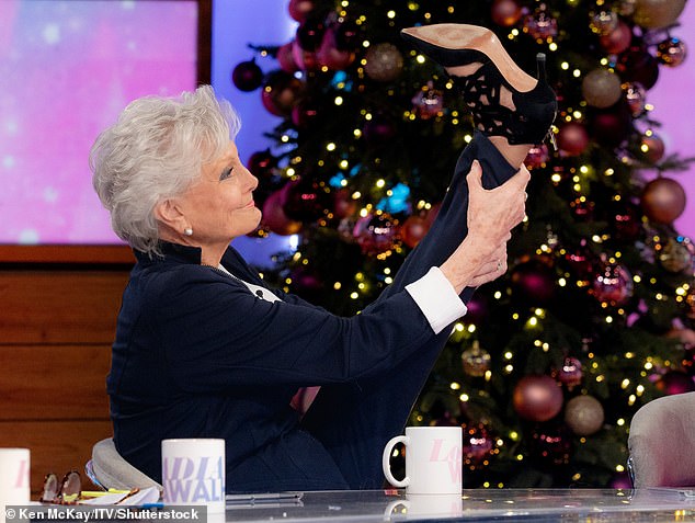 The broadcasting legend also showed off her famous high kick from behind the Loose Women panel