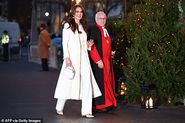 The Princess of Wales waves as she arrives for the service at Westminster Abbey today