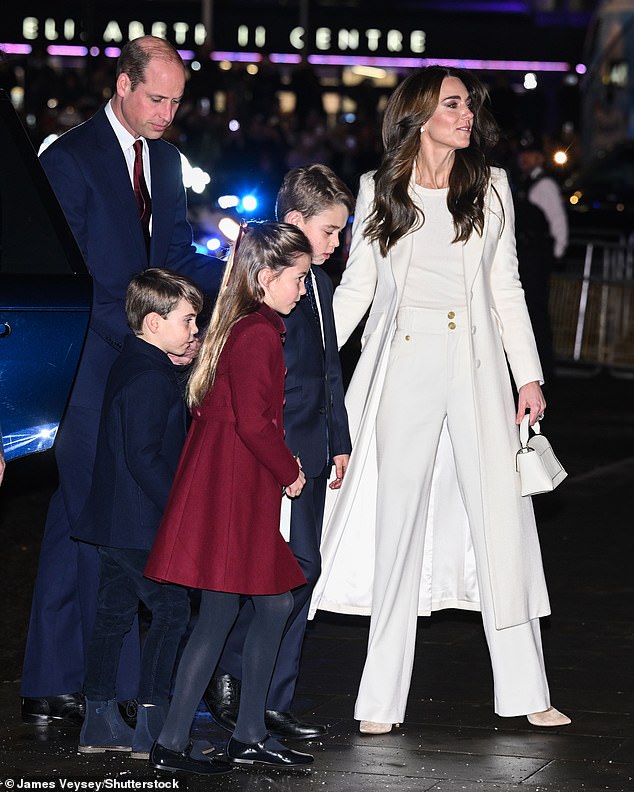 The royals put on an elegant show and William paired his children's outfit with a color theme of navy blue and red