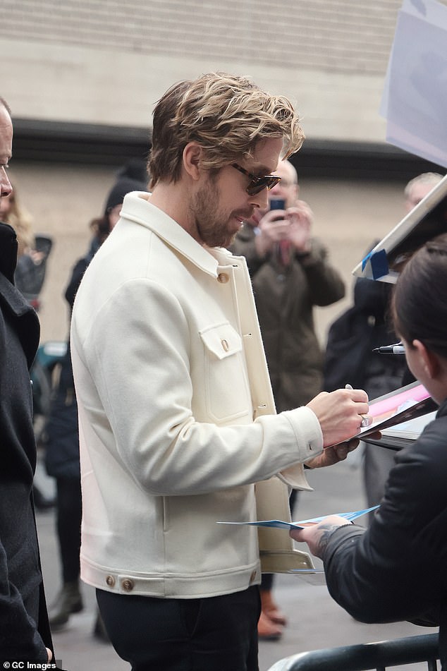 On Friday, Ryan was seen stopping to sign autographs for fans as he entered the venue for the In Conversation about Barbie Q&A event and screening