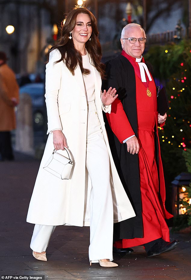 The Princess of Wales waves as she arrives for the service at Westminster Abbey today