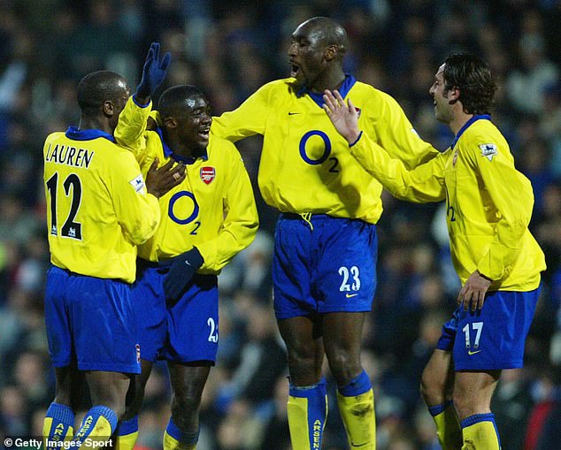 Campbell (second from right) teamed up with Kolo Toure (second from left) in 25 of the 38 matches in the 2003/04 season