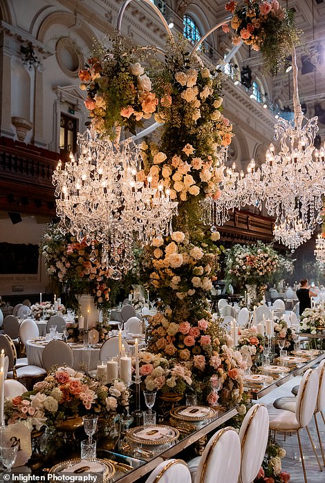 The tables had incredible flower arrangements that ran both horizontally and vertically