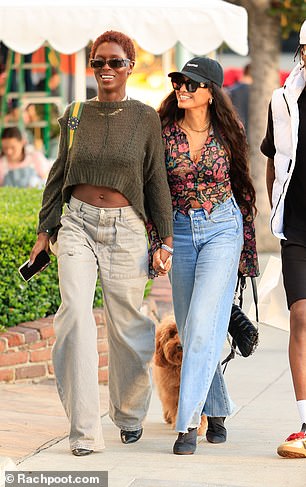 The actress, 37, seemed in good spirits as she took a walk with her boyfriend Nancy Gomez and her brother Richard Smith before grabbing a bite to eat.