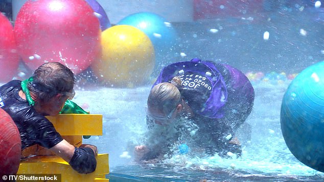 But after being hit by a hose of water, Josie lost her grip on one of the stars, sending it flying back down the slide.