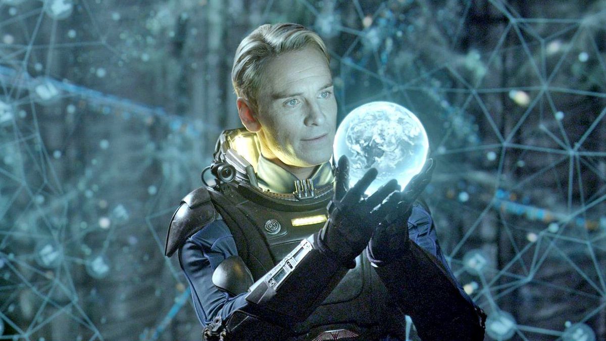 Michael Fassbender as android David holding a holographic globe in Prometheus.