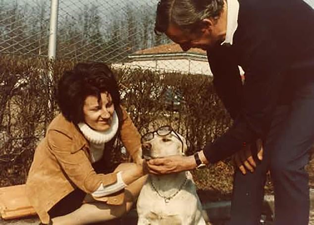 Brenda Vernor pictured with Fred the dog and British racing driver Mike Parkes in 1973