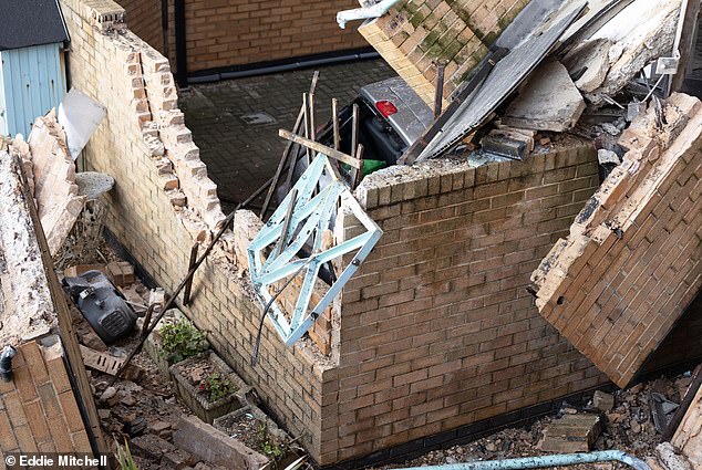 Jenny Burrow, an upstairs resident of Prince of Wales Court in Hove, heard her neighbours' houses being ripped in half