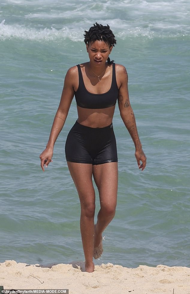 The Los Angles-born star, who is the daughter of Will Smith and Jada Pinkett Smith, showed off her athletic figure in a black two-piece swimsuit