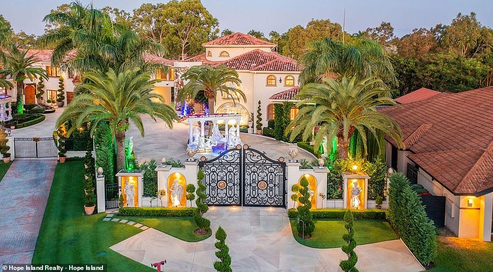 Set behind grand two-ton gates, the opulent property features a beautiful sandstone driveway and marble-clad majestic courtyard