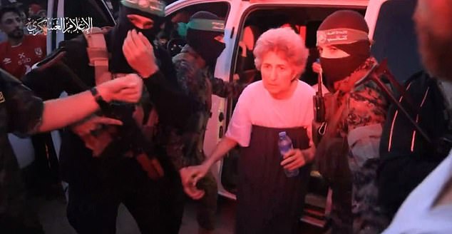 Adina Moshe, 72, was released by Hamas after 49 days.  She was filmed pushing away a Hamas fighter's hand during her release (photo)