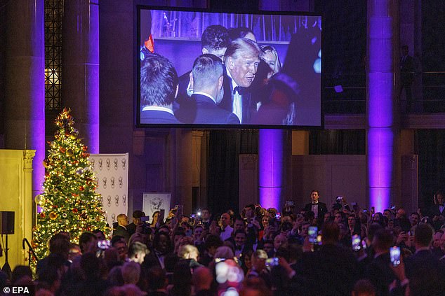 The crowd chanted Trump's name and responded to his remarks with rapturous applause