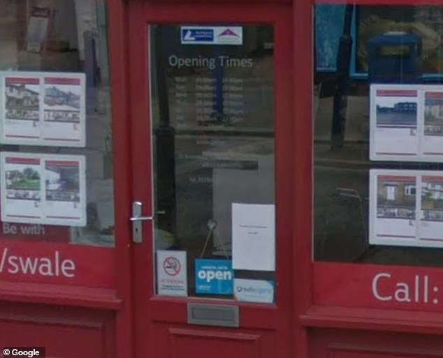 No smoking signs have been attached to the estate agent's front door, on Broadway in Sheerness