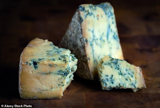 By removing the mold from a block of hard cheese and leaving an inch around it, you can eat it safely.  Blue cheese (pictured) is made with mold that is safe to eat