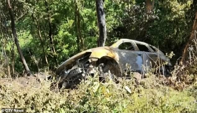 The burned vehicle.  Langlois and Marchand were 'ambushed' by a hitman who killed them and then set their car on fire, according to police