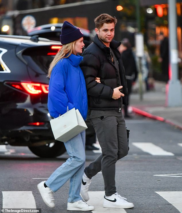 The former co-stars and current couple were spotted with their arms linked as they strolled through the busy streets and went shopping together