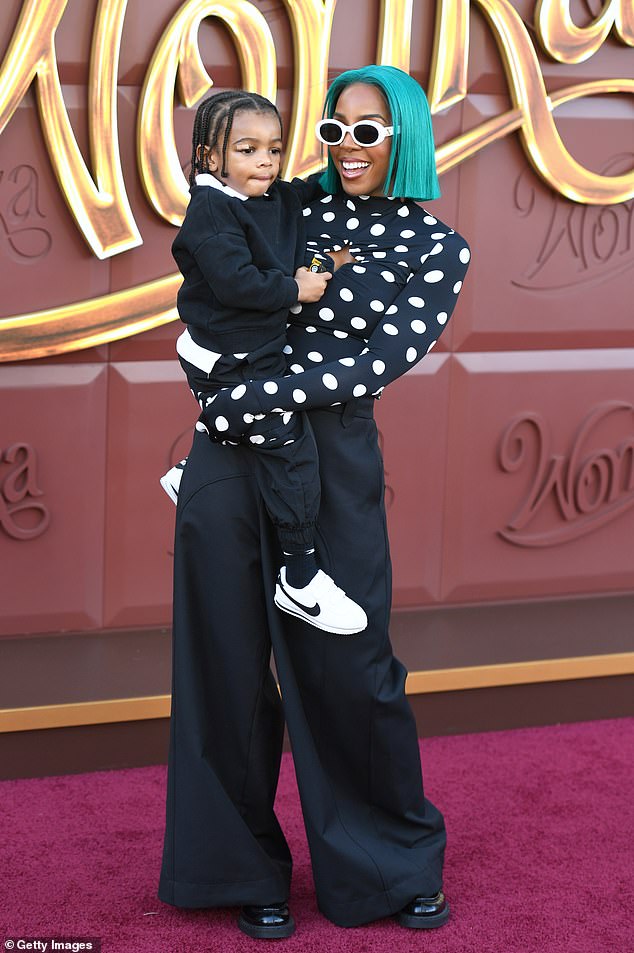 Kelly and her son pictured in a sweet moment on the red carpet