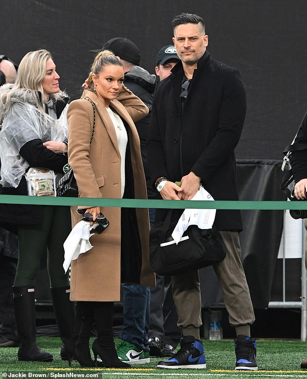 For Sunday's sporting event, the Magic Mike star wore a black t-shirt and brown sweatpants with a black jacket and high-top sneakers