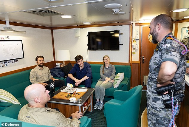 BOM personnel were welcomed aboard HMAS Brisbane following their evacuation from Willis Island