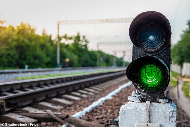 A new study has warned that train accidents could be caused by solar storms that change signaling from red to green (stock image)