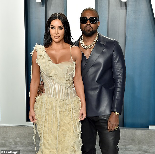 Kanye with his ex-wife Kim Kardashian with whom he has four children.  The couple divorced in November last year