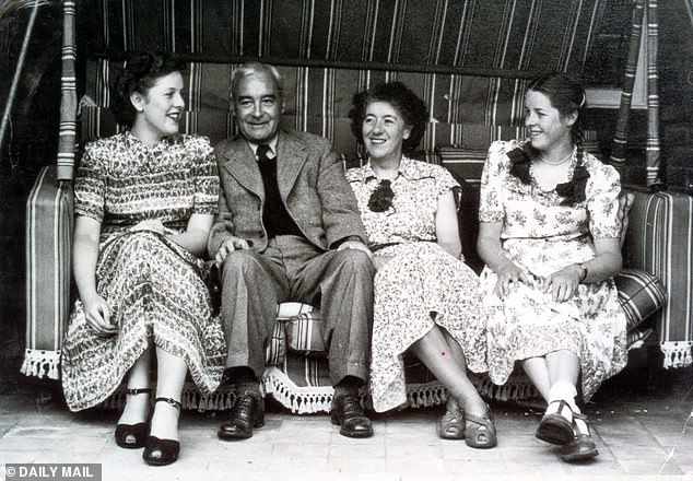Blyton is seen with her second husband Kennth Darrell Waters and her daughters Gillian (left) and Imogen