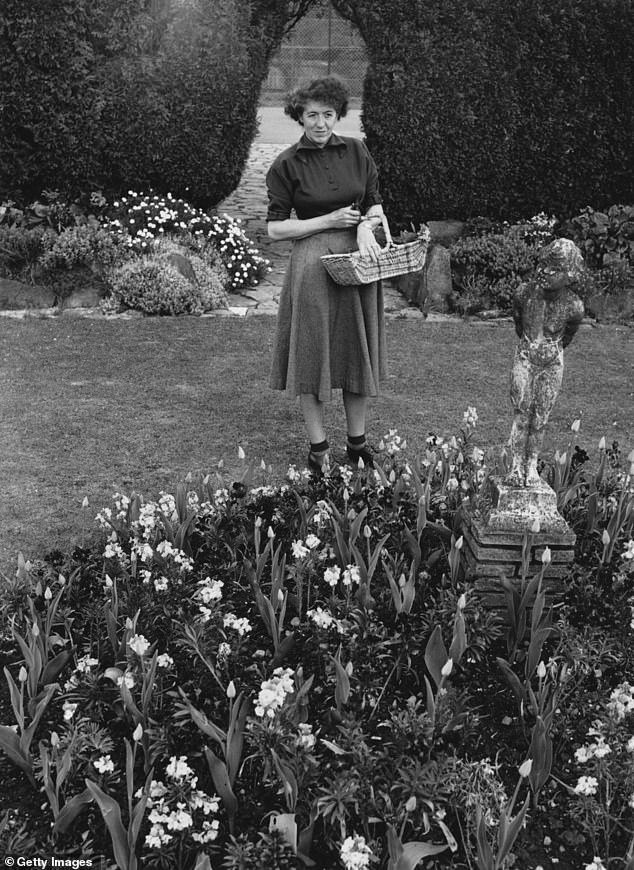 Blyton tends the garden of her palatial home in 1949.  By then she was with her second husband