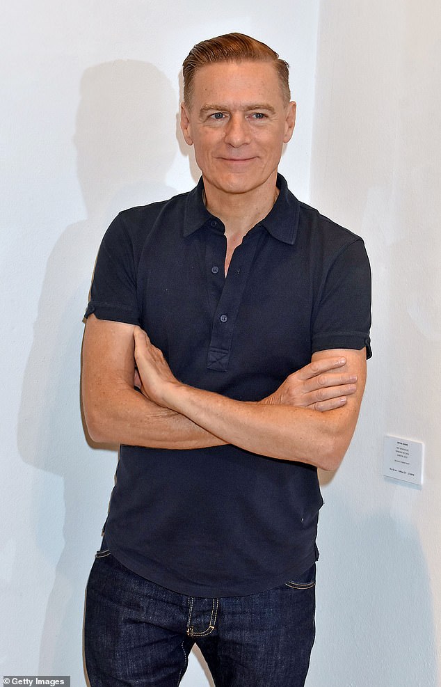 Bryan Adams poses before the opening of his exhibition 'Exposed' at Camera Works in December 2018