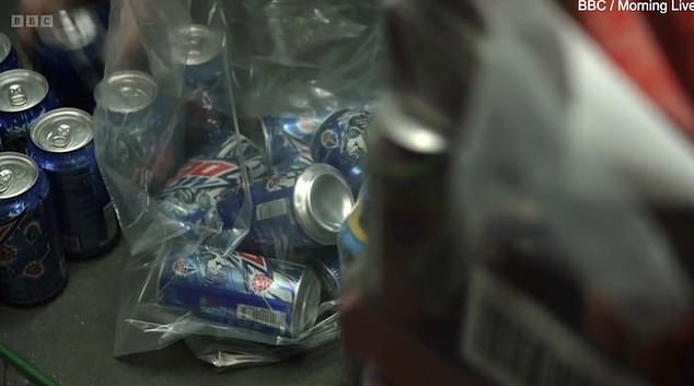Above are cans of Mountain Dew seized by officials in Britain
