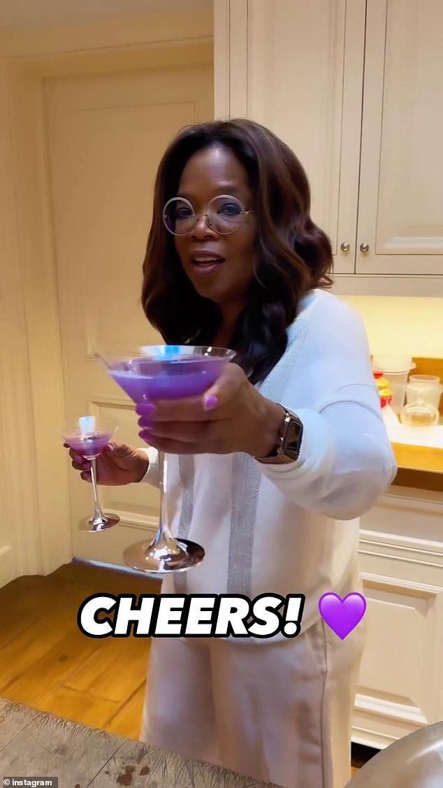 The acclaimed talk show host, 69, showed off her slimmed-down physique in a new Instagram video, which saw her chef making purple mocktails in honor of the upcoming Color Purple movie.