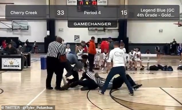 One referee was knocked to the ground, while the referee who delivered the blow was restrained