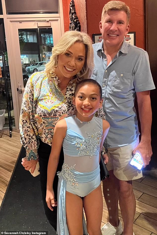 The couple officially adopted Chloe in 2017, after taking her in when her father Kyle Chrisley – Todd and Julie's son – battled addiction;  Julie, Chloe and Todd are pictured