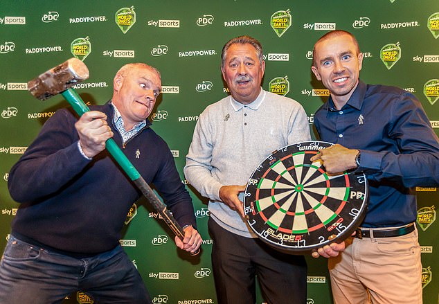 Paddy Power (left) was pictured with ex-professional darts player and prostate cancer survivor Dennis Priestly (centre) alongside Matt Holdstock of Prostate Cancer UK before the launch last month