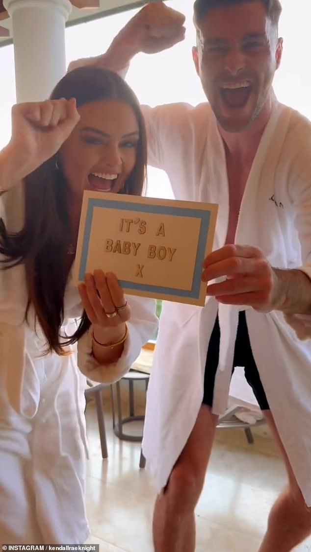 Andrew and Kendall pumped their fists in the air and beamed as they held up the card that read, 