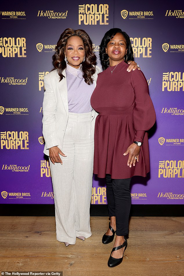 The TV icon, 69, wowed as she cut a stylish figure in a linen suit and shiny lilac sweater while accompanied by American journalist Nekesa Mumbi Moody