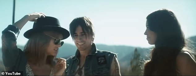 Martinez (right) met Taylor while filming a music video for I Knew You Were Trouble