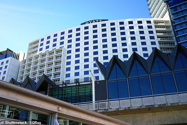 Her then boyfriend, 51, was arrested by police on Tuesday (pictured, the Hyatt Regency in Darling Harbour)