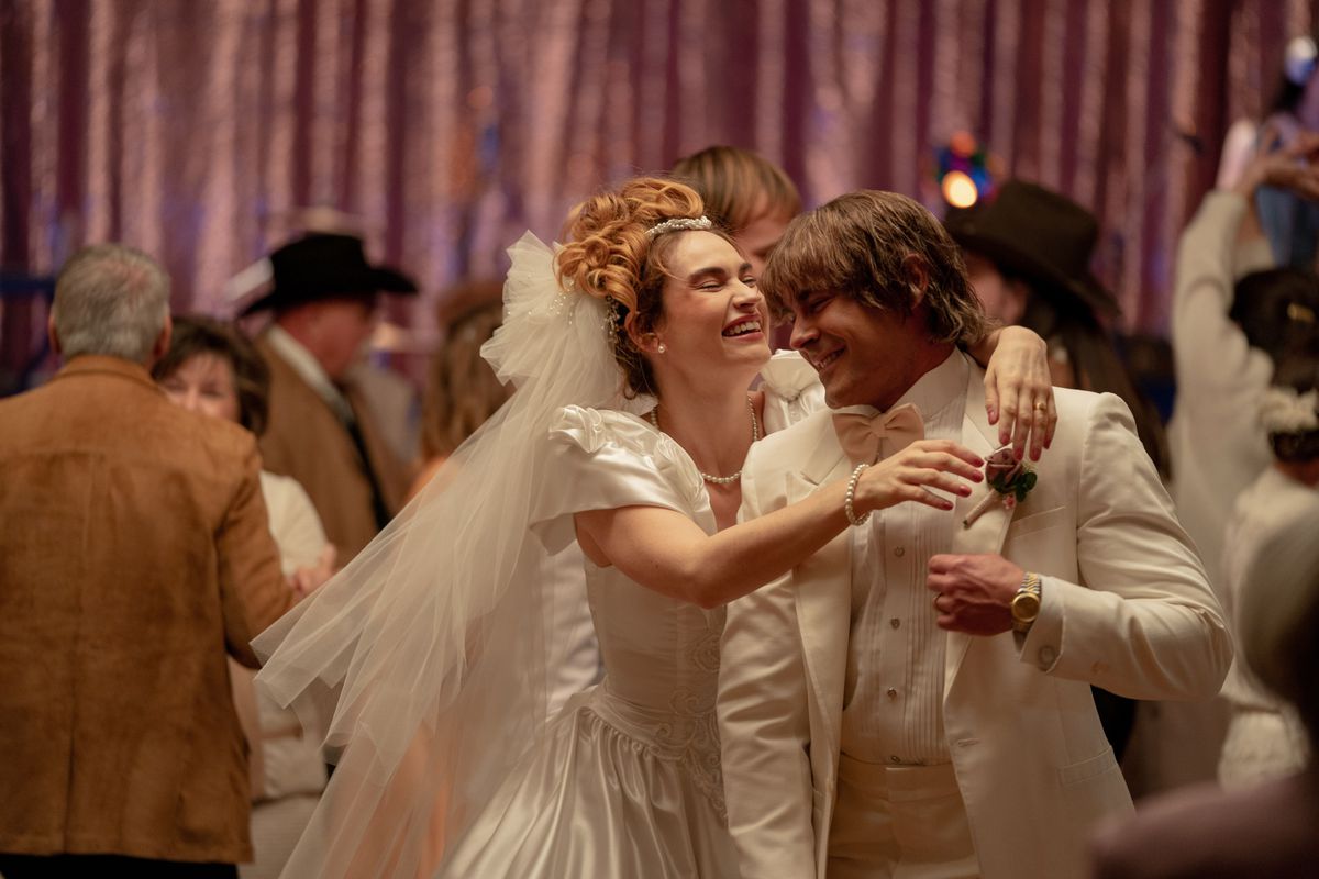 Zac Efron and Lily James dance at a wedding at The Iron Claw