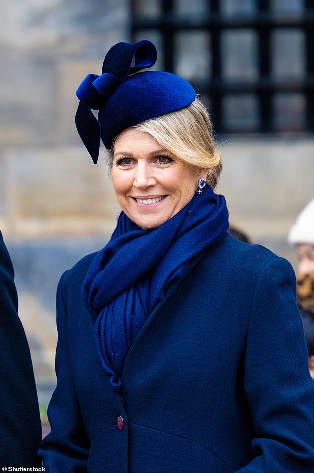 Maxima dressed warmly as she added a navy blue scarf and matching fascinator to her sophisticated ensemble