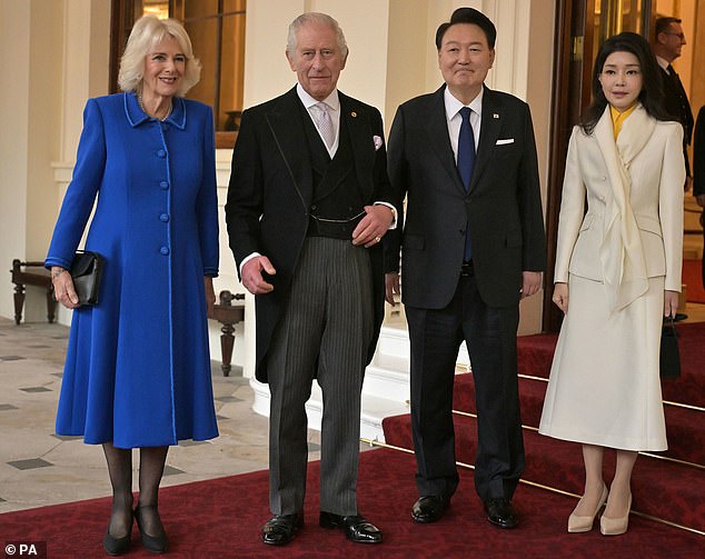 Queen Camilla and King Charles pose with South Korea's President Yoon Suk Yeol and his wife, Kim Keon Hee, during a formal farewell at Buckingham Palace last month