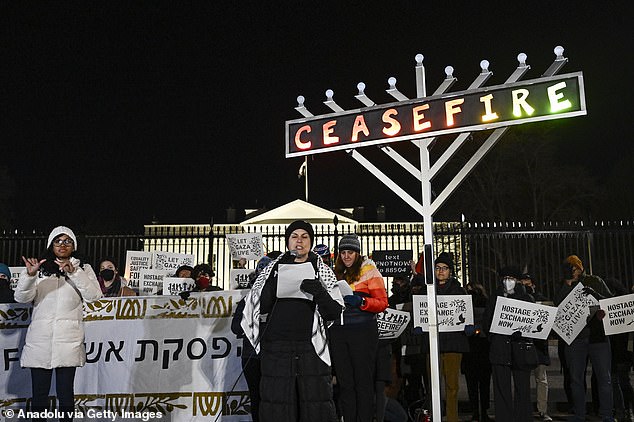 A community of Jewish groups gather outside the White House on the fifth night of Hanukkah, the Jewish festival of lights