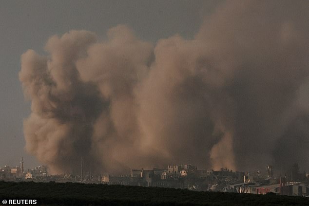 Smoke rises over Gaza, amid the ongoing conflict between Israel and the Palestinian Islamist group Hamas, seen from southern Israel