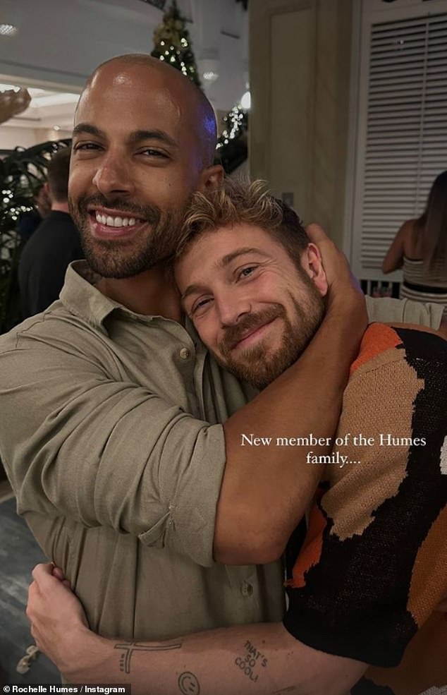 Rochelle also shared a photo of Marvin hugging Sam as she joked that the Made In Chelsea star was a 'new member of the Humes family'