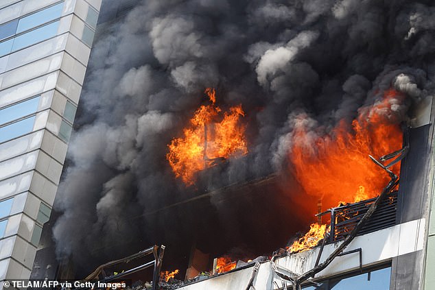 The sixth and seventh floors of the building next to the country's Ministry of Labor at Avenida Alem 668, near the country's coast on the Argentine Sea, were engulfed by smoke and flames