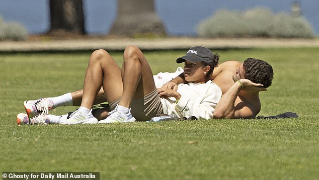 The couple's romance became public when Daily Mail Australia exclusively captured photos of them sharing some tender moments in a Perth park on October 31 (pictured)