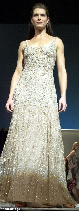 Her mother wore the vintage Badgley Mischka dress at Marshall Field's Fash Bash at the Chicago Theater in Chicago in 2001